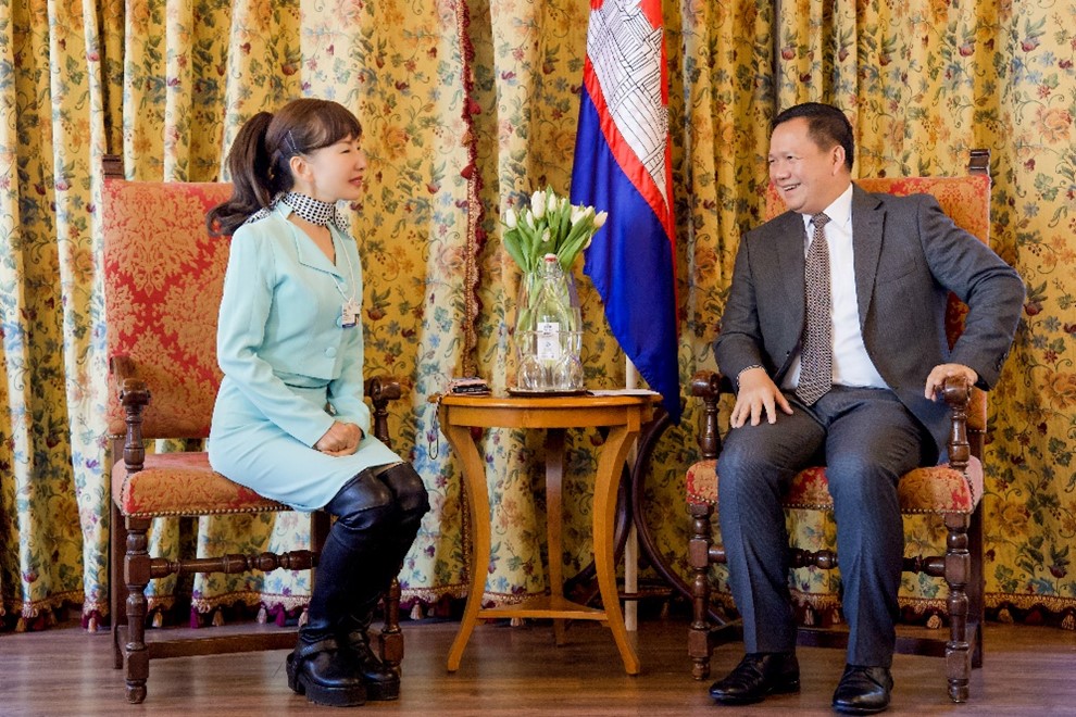 Ms Jane Sun, CEO of Trip.com Group (left), and Prime Minister of Cambodia Hun Manet (right) discuss strategies to enhance tourism in Cambodia.