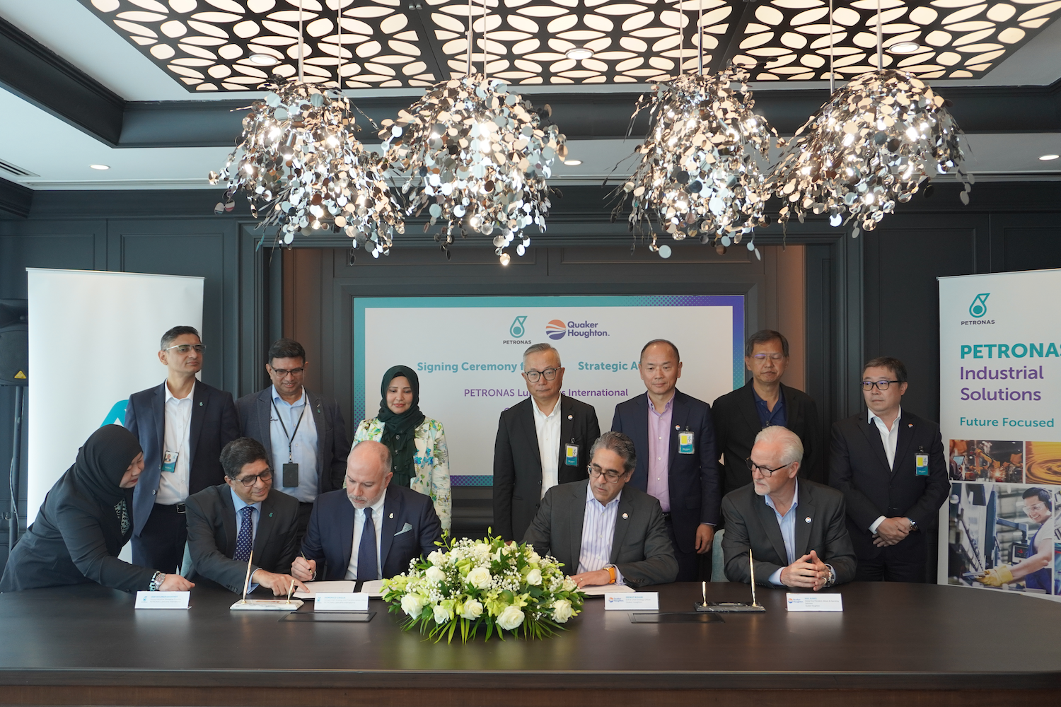 Seated from left: Uday Kumar, Group Industrial Managing Director, PETRONAS Lubricants International; Domenico Ciaglia, Group Chief Strategy and Transformation Officer, PETRONAS Lubricants International; Jeewat Bijlani, Executive Vice President, Global Specialty and Chief Growth Officer, Quaker Houghton; and Karl Kunkel, Global Vice President, Metals & Operating Solutions, Quaker Houghton, along with representatives from both companies. (2)