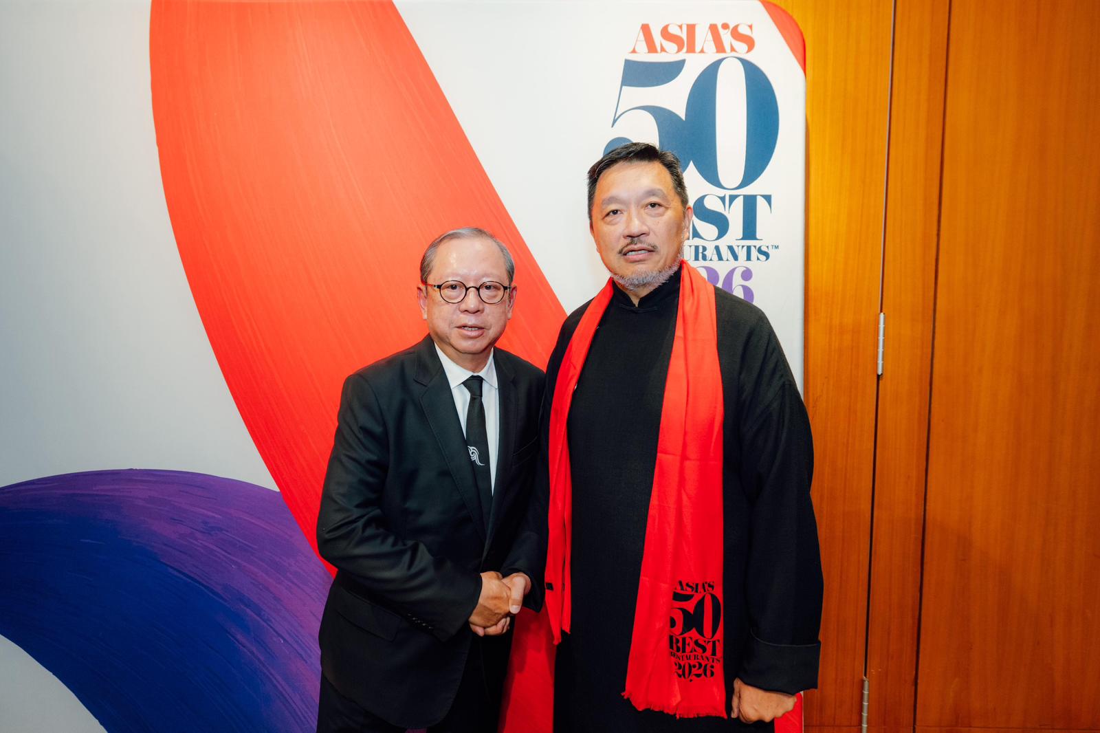 Hong Kong Tourism Board (HKTB) Chairman Dr Peter Lam, left, and Danny Yip from top local Cantonese restaurant The Chairman, winner of the first place award, at the Asia’s 50 Best Restaurants 2026 Awards.